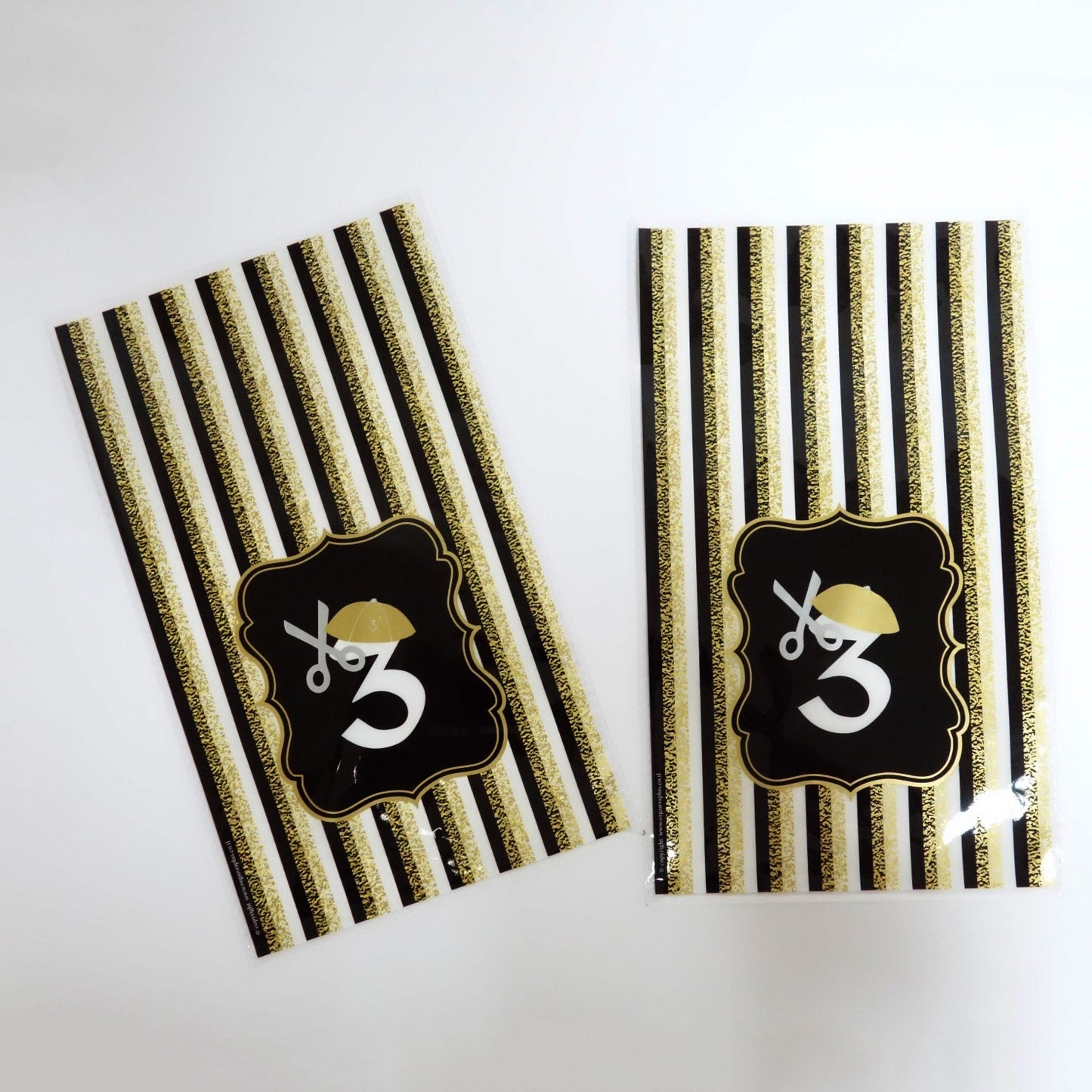 Black & Gold striped cellophane bag number 3  with Kippah and scissors