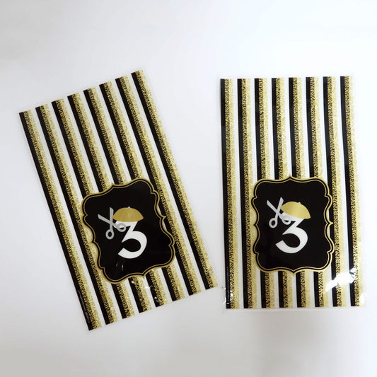 Black & Gold striped cellophane bag number 3  with Kippah and scissors