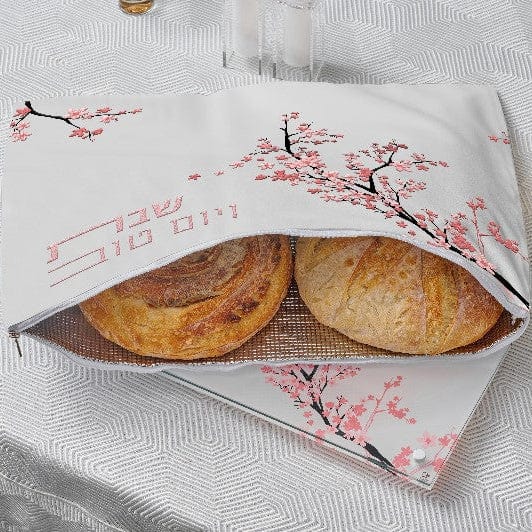 Cherry Blossom Challah Pouch Cover on a  table.