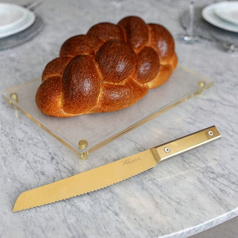 Classic Challah Knife - Premium gold challah knife with serrated blade and simple handle, and fresh-baked challah bread for Shabbat or holiday meal setting - Waterdale Collection