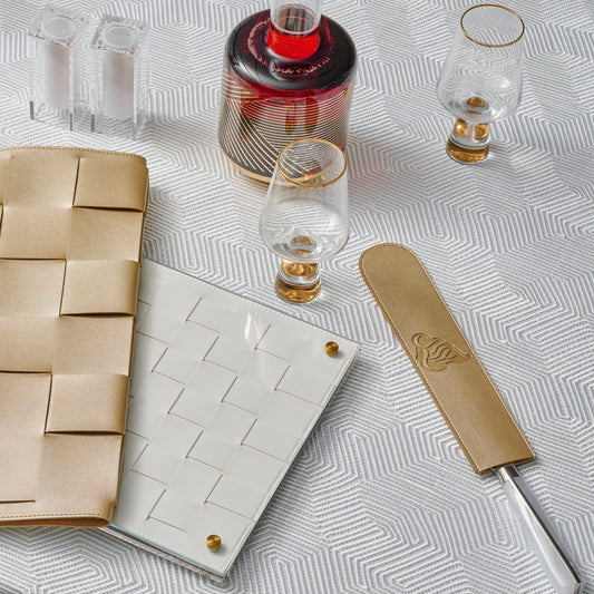 Regal Knife Blade Cover displayed on an elegant white patterned tablecloth with matching tableware