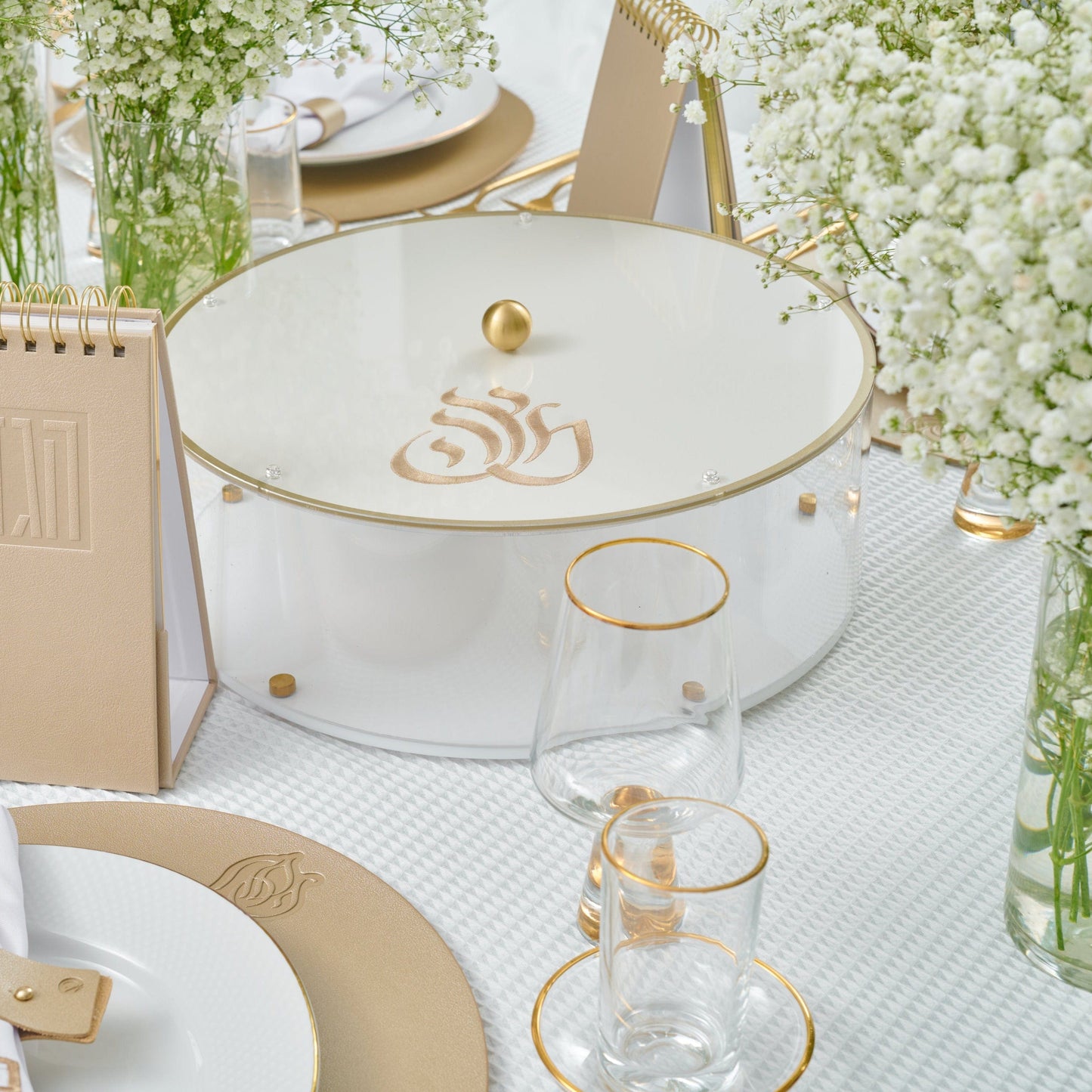 Regal Matzah Box with gold accents and elegant script detail displayed on a white and gold Passover table