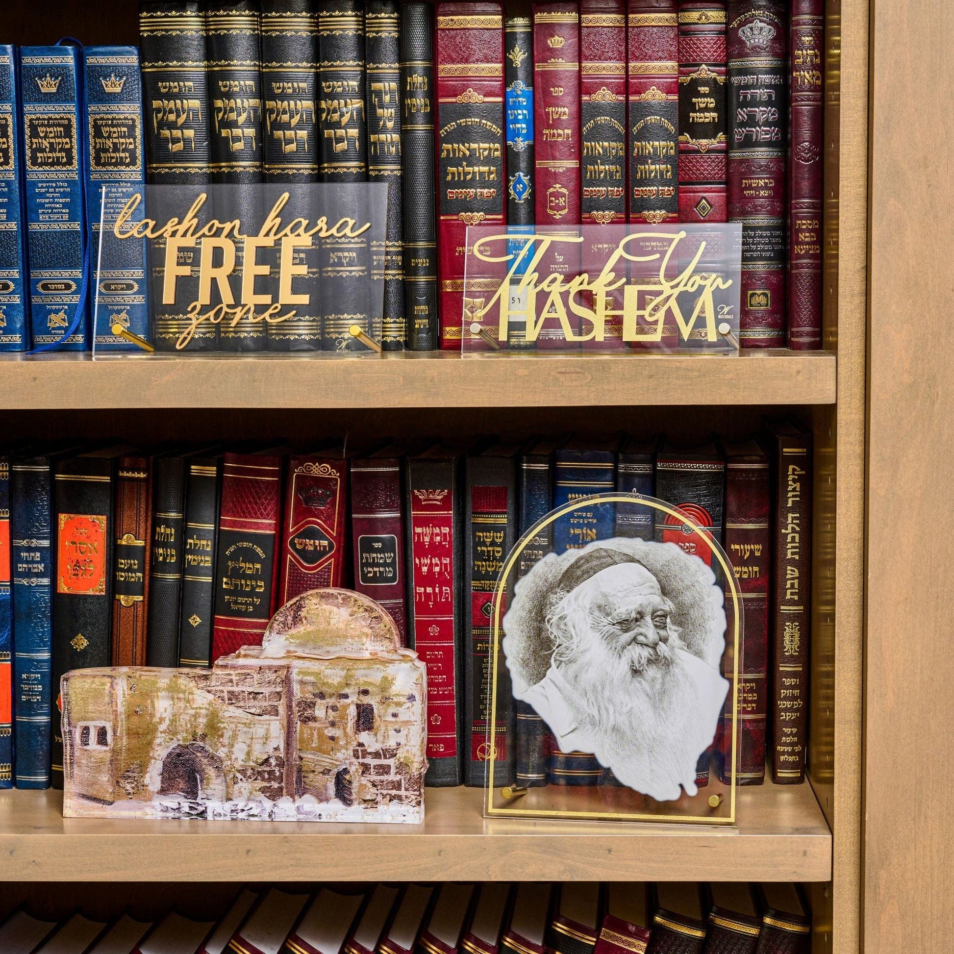 Kever Rochel Sculpture on a book shelf.